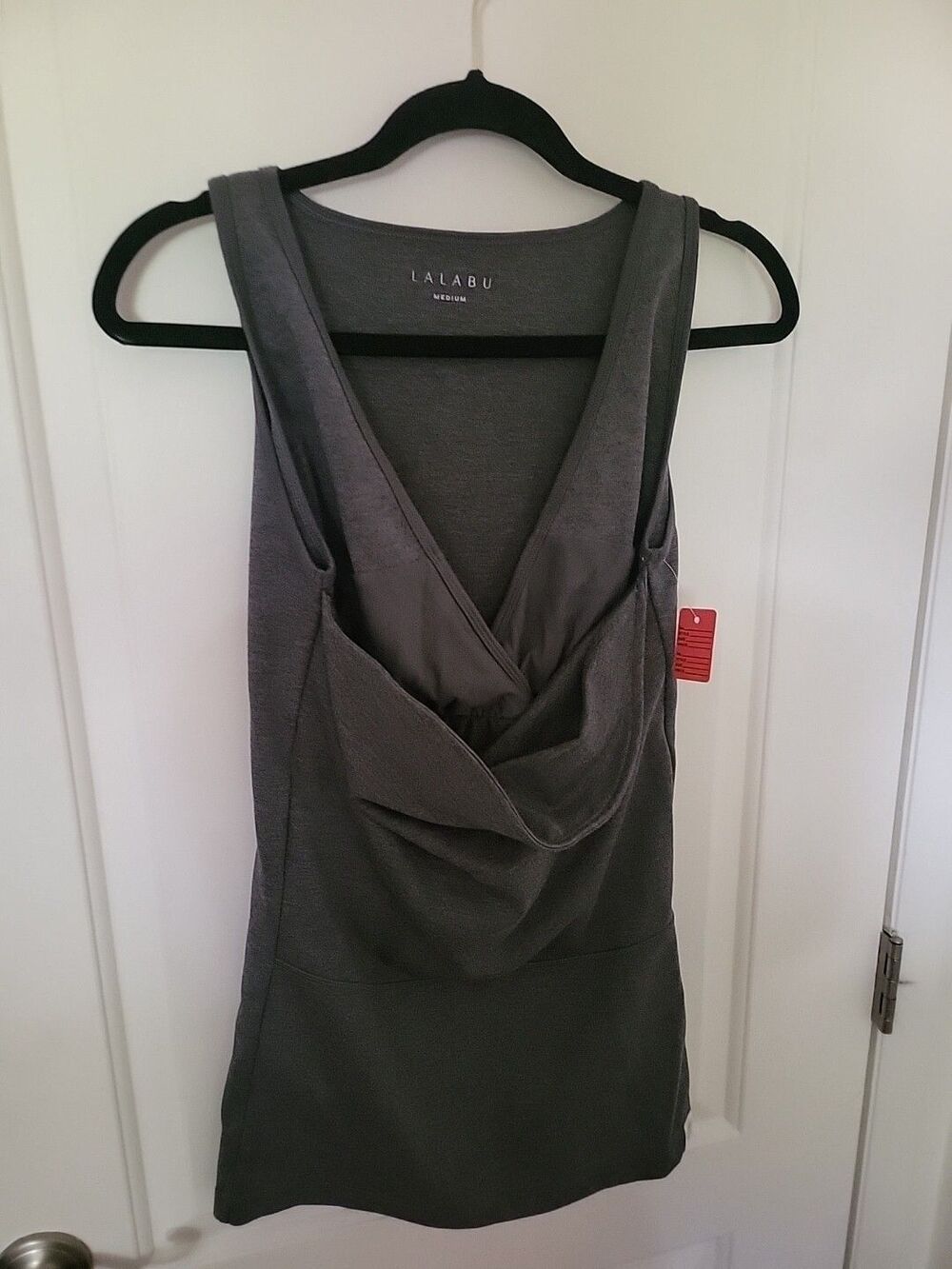 Lalabu Soothe Baby Wearing Sleeveless Shirt in Gray Size Medium